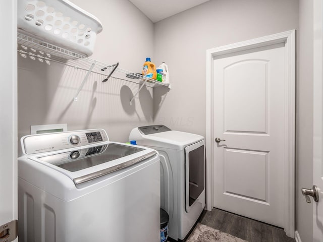 326 Mannaseh Dr W, Granville, OH 43023 - laundry room featuring washer and dryer and dark wood-style floors