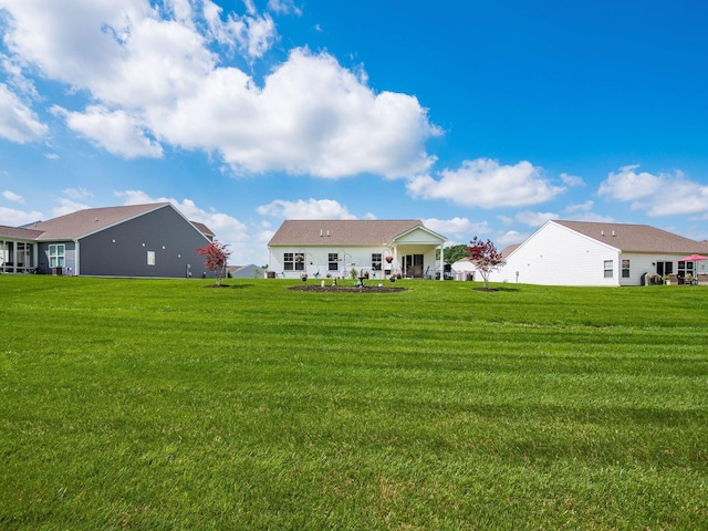 326 Mannaseh Dr W, Granville, OH 43023 - rear view of house featuring a lawn