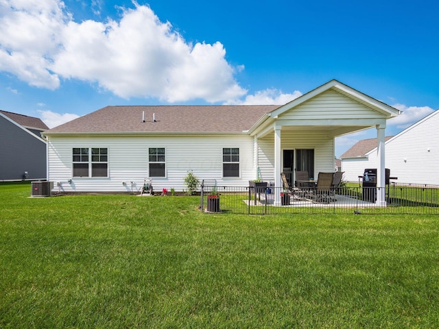 326 Mannaseh Dr W, Granville, OH 43023 - back of property featuring a patio and a shingled roof