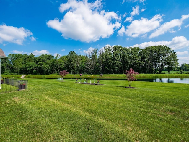 326 Mannaseh Dr W, Granville, OH 43023 - view of home's community with a water view and a yard