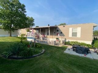 5510 Coopers Hawk Cir, Dublin, OH 43016 - back of property featuring a lawn