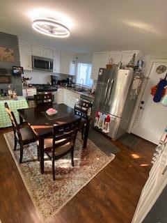 5510 Coopers Hawk Cir, Dublin, OH 43016 - dining space featuring dark wood finished floors