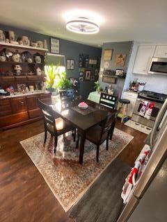 5510 Coopers Hawk Cir, Dublin, OH 43016 - dining space featuring dark wood finished floors