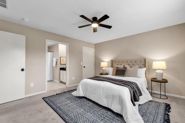 9460 Clermont Cir, Powell, OH 43065 - bedroom with light colored carpet, ensuite bath, and a ceiling fan