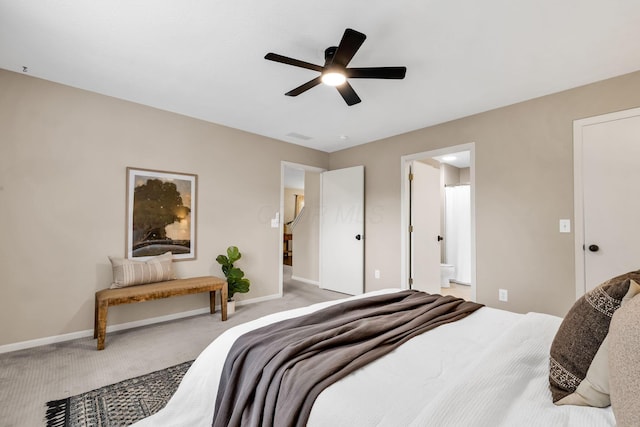 9460 Clermont Cir, Powell, OH 43065 - bedroom with carpet flooring, connected bathroom, and a ceiling fan