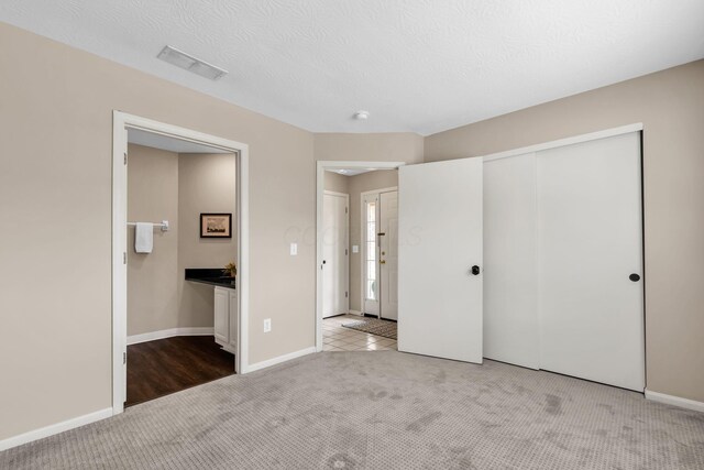 9460 Clermont Cir, Powell, OH 43065 - unfurnished bedroom with carpet floors, a closet, and connected bathroom