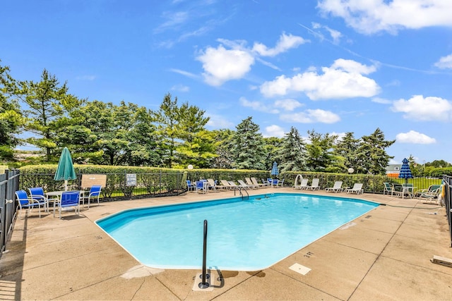 9460 Clermont Cir, Powell, OH 43065 - community pool featuring a patio