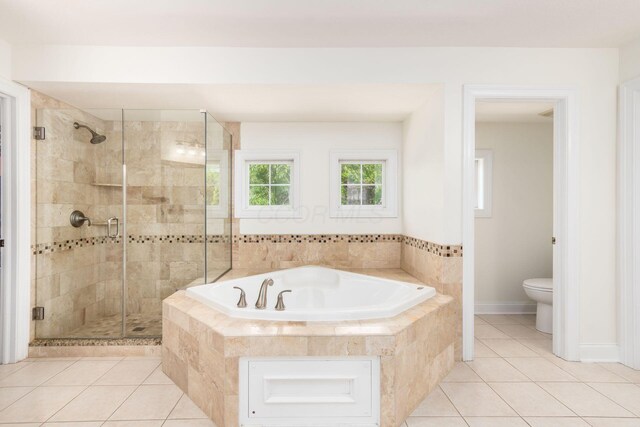 5866 Morganwood Sq, Hilliard, OH 43026 - full bath with a bath, a shower stall, and tile patterned flooring