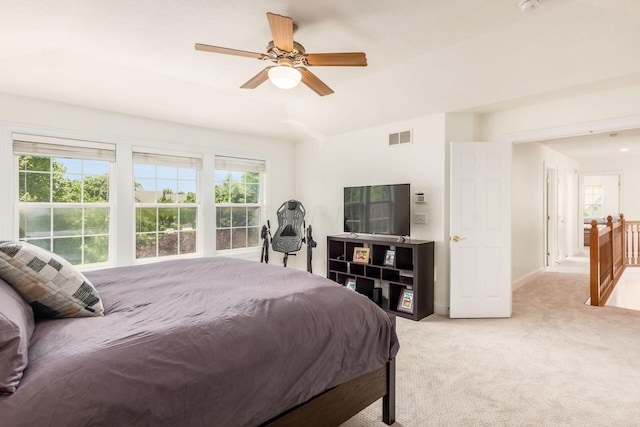 5866 Morganwood Sq, Hilliard, OH 43026 - bedroom featuring multiple windows, light carpet, and a ceiling fan