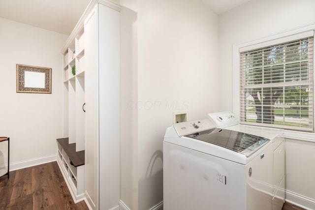5866 Morganwood Sq, Hilliard, OH 43026 - washroom featuring washing machine and dryer and dark wood-type flooring