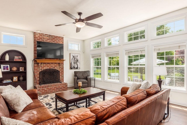 5866 Morganwood Sq, Hilliard, OH 43026 - living area featuring a ceiling fan and a fireplace
