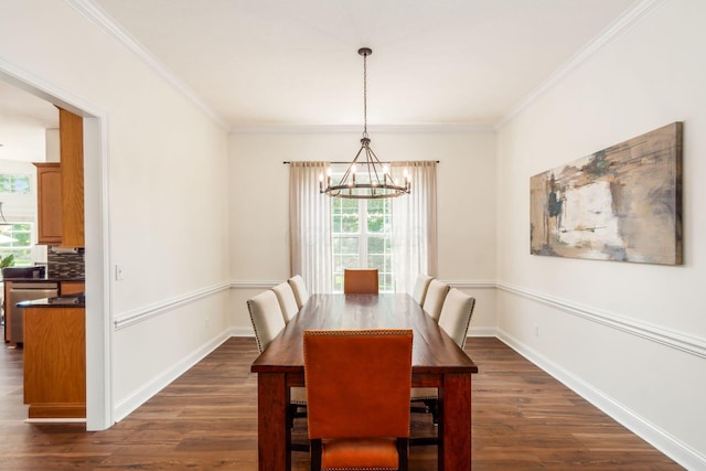 5866 Morganwood Sq, Hilliard, OH 43026 - dining room featuring plenty of natural light, a chandelier, dark wood-style flooring, and crown molding