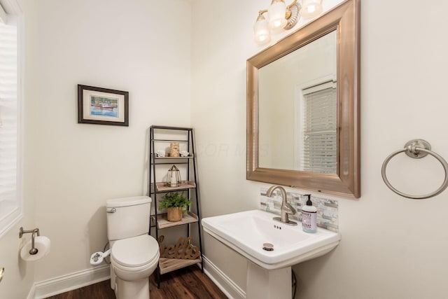 5866 Morganwood Sq, Hilliard, OH 43026 - half bathroom featuring wood finished floors and toilet