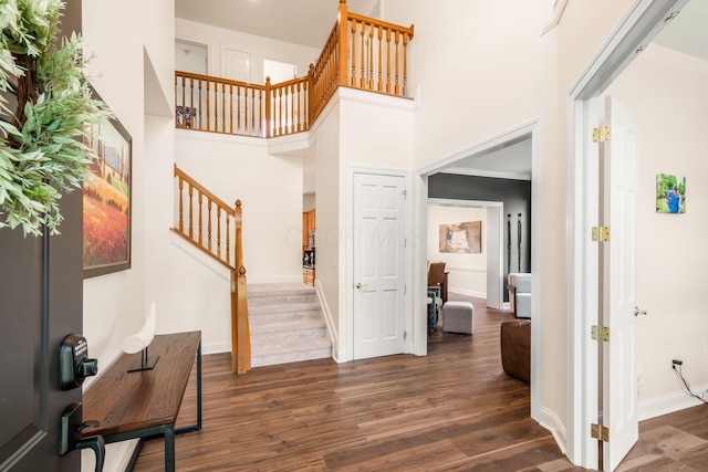 5866 Morganwood Sq, Hilliard, OH 43026 - entrance foyer featuring stairway, dark wood-style floors, and a towering ceiling