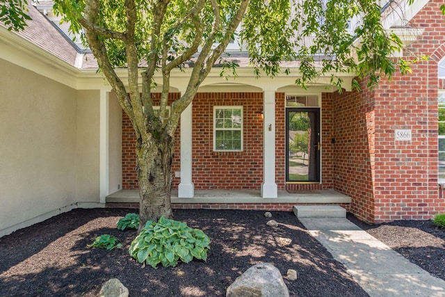 5866 Morganwood Sq, Hilliard, OH 43026 - entrance to property featuring brick siding and covered porch