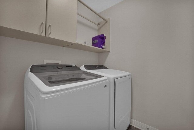 5405 Boucher Dr, Orient, OH 43146 - washroom featuring separate washer and dryer and cabinet space