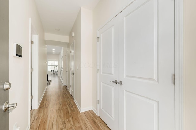 605 Frebis Ave, Columbus, OH 43206 - corridor featuring light wood-style floors and baseboards