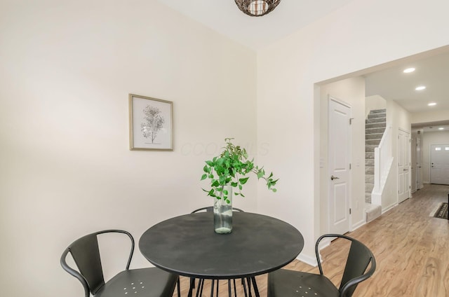 605 Frebis Ave, Columbus, OH 43206 - dining space with light wood-style flooring, recessed lighting, and stairs