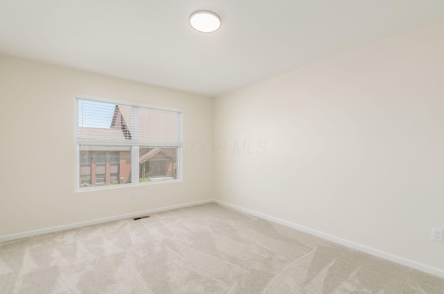 605 Frebis Ave, Columbus, OH 43206 - empty room featuring carpet floors and baseboards