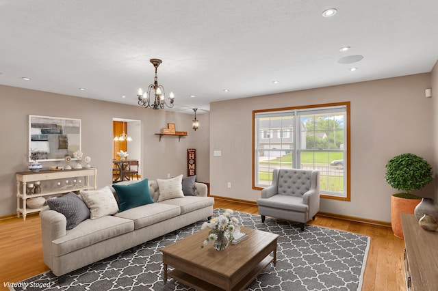 159 Hathaway Rd, West Jefferson, OH 43162 - living room featuring a chandelier, light wood-style flooring, and recessed lighting
