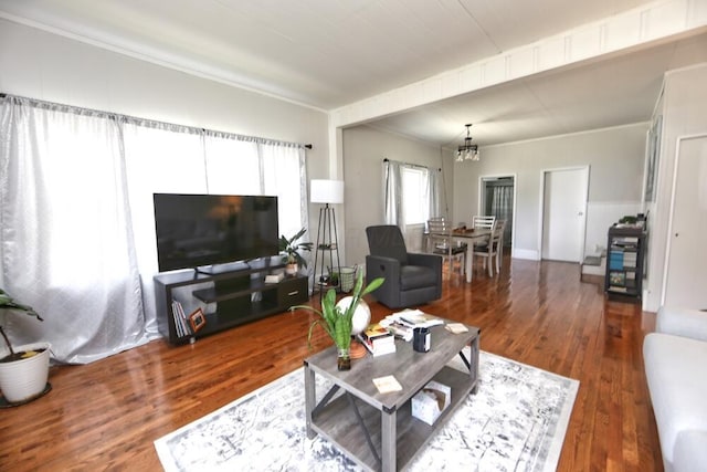 93 E 6th St, Fredericktown, OH 43019 - living area with a chandelier, wood finished floors, and ornamental molding