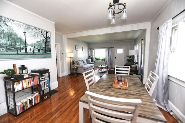 93 E 6th St, Fredericktown, OH 43019 - dining room with ornamental molding, wood finished floors, and a chandelier
