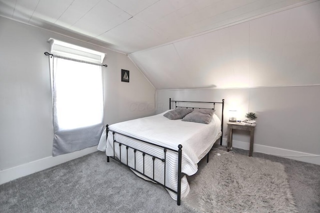 93 E 6th St, Fredericktown, OH 43019 - carpeted bedroom featuring vaulted ceiling and baseboards