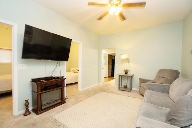 169 Myers Ave, Buckeye Lake, OH 43008 - carpeted living area featuring ceiling fan and baseboards
