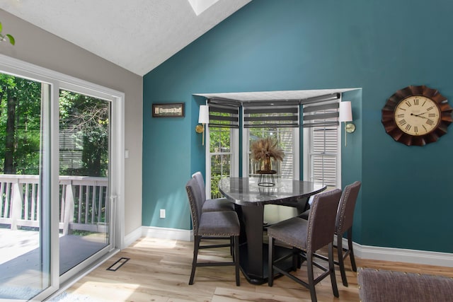168 Thornapple Trl, Delaware, OH 43015 - dining space featuring light wood-style floors and high vaulted ceiling