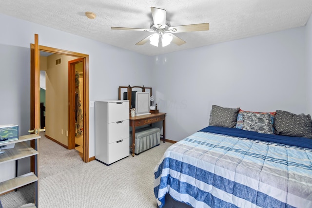168 Thornapple Trl, Delaware, OH 43015 - bedroom with carpet, a textured ceiling, and ceiling fan