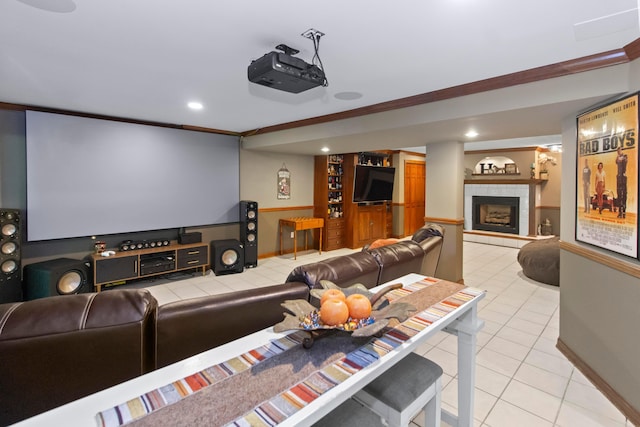168 Thornapple Trl, Delaware, OH 43015 - cinema with light tile patterned floors, a tiled fireplace, crown molding, and recessed lighting