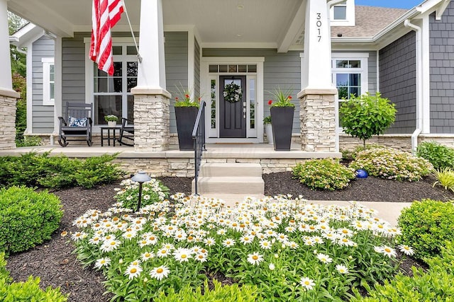 3017 Highland Woods Blvd, New Albany, OH 43054 - entrance to property with a porch, stone siding, and a shingled roof