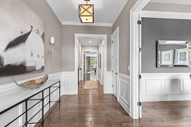 3017 Highland Woods Blvd, New Albany, OH 43054 - hallway with dark wood finished floors, ornamental molding, and wainscoting