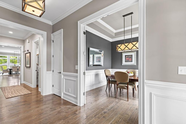 3017 Highland Woods Blvd, New Albany, OH 43054 - dining space with dark wood-style floors, crown molding, and wainscoting