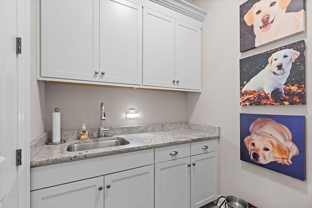 3017 Highland Woods Blvd, New Albany, OH 43054 - kitchen featuring white cabinets and light stone countertops