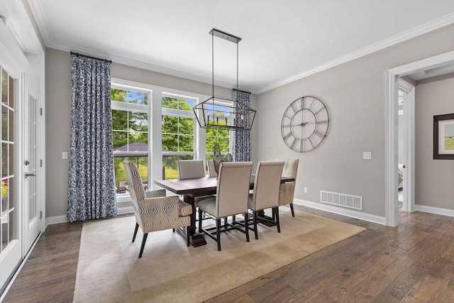 3017 Highland Woods Blvd, New Albany, OH 43054 - dining space with wood finished floors, crown molding, and a chandelier