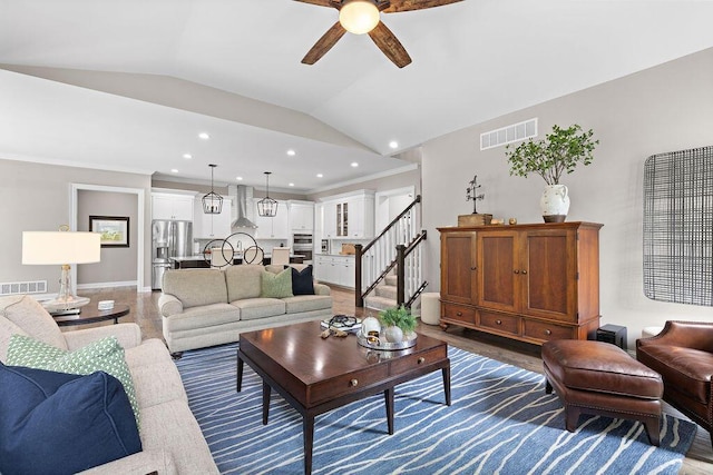 3017 Highland Woods Blvd, New Albany, OH 43054 - living area featuring ceiling fan, lofted ceiling, recessed lighting, stairs, and crown molding