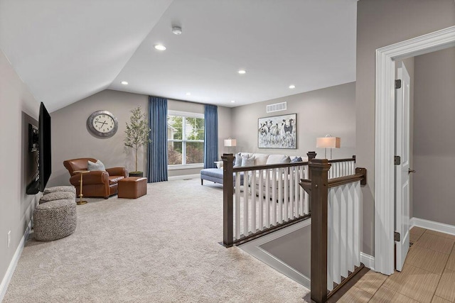 3017 Highland Woods Blvd, New Albany, OH 43054 - living area with vaulted ceiling, recessed lighting, and carpet floors