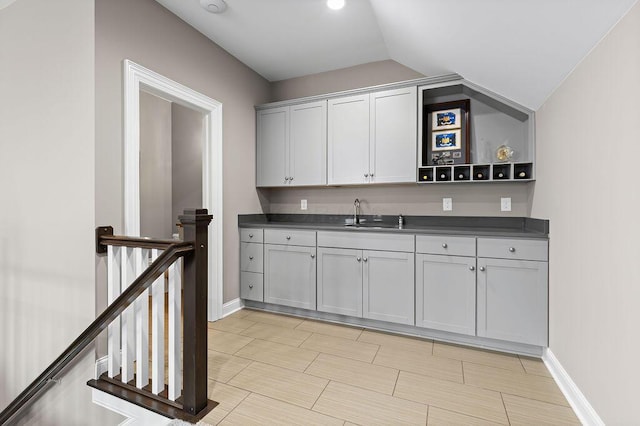 3017 Highland Woods Blvd, New Albany, OH 43054 - indoor wet bar with vaulted ceiling and baseboards