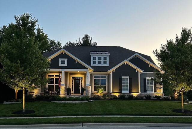 3017 Highland Woods Blvd, New Albany, OH 43054 - craftsman house with a front yard and a porch