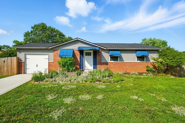 1574 River Bend Rd, Columbus, OH 43223 - ranch-style house with brick siding, a garage, and concrete driveway