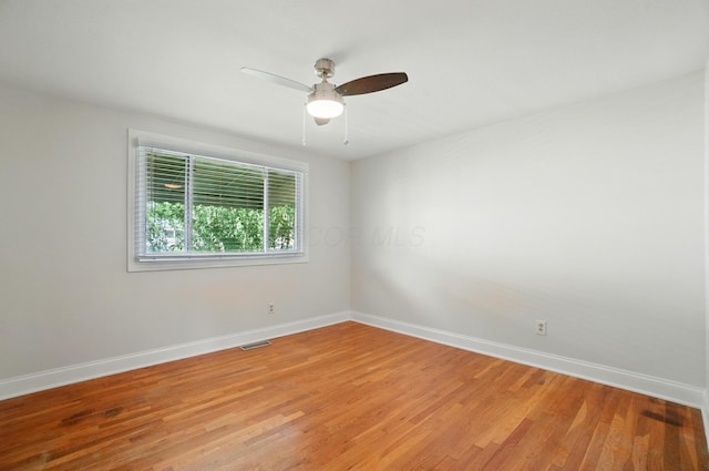1574 River Bend Rd, Columbus, OH 43223 - unfurnished room with light wood finished floors and ceiling fan