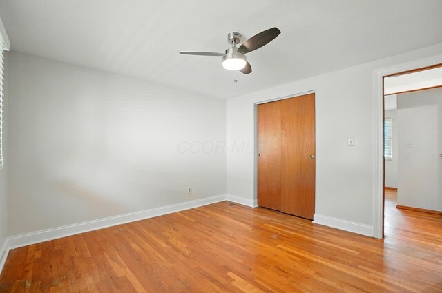 1574 River Bend Rd, Columbus, OH 43223 - unfurnished bedroom with light wood finished floors, a closet, and ceiling fan