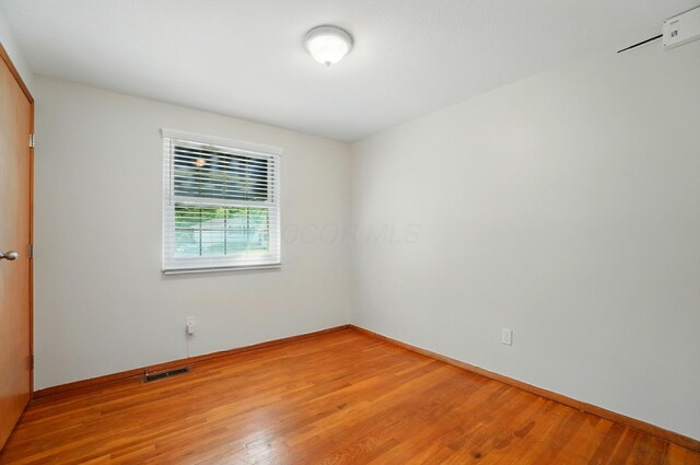 1574 River Bend Rd, Columbus, OH 43223 - unfurnished room featuring light wood-style flooring and baseboards