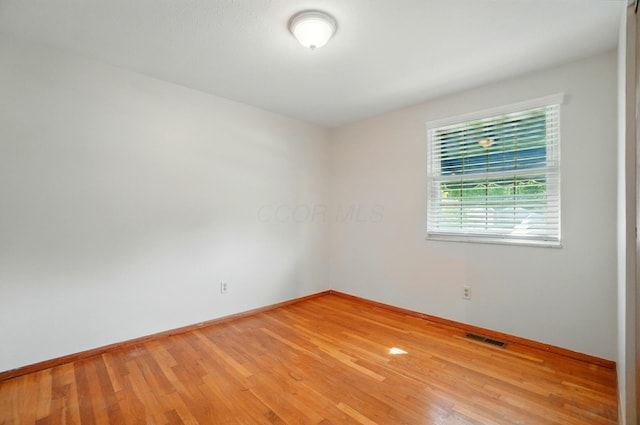 1574 River Bend Rd, Columbus, OH 43223 - spare room featuring baseboards and light wood-style floors