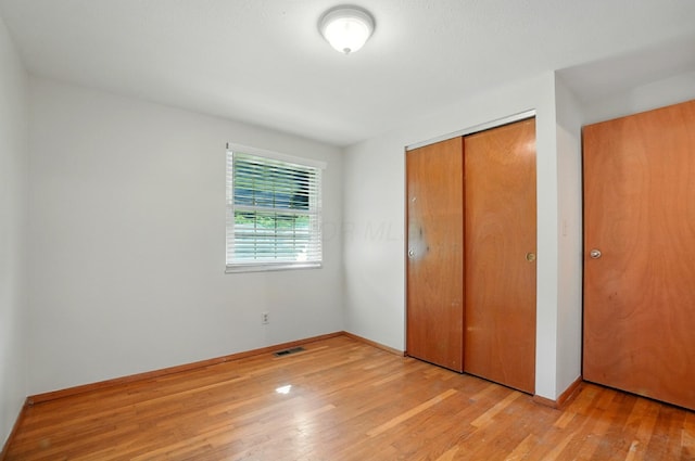1574 River Bend Rd, Columbus, OH 43223 - unfurnished bedroom featuring a closet and light wood finished floors