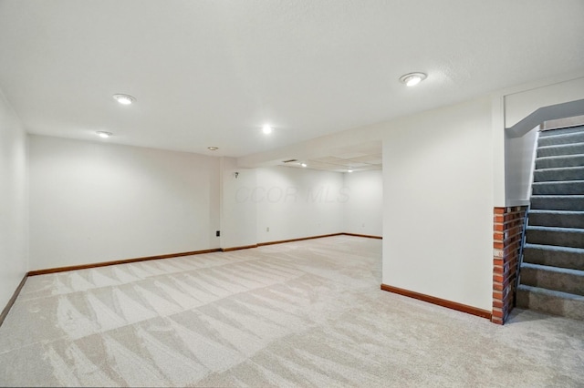 1574 River Bend Rd, Columbus, OH 43223 - finished below grade area featuring carpet floors, stairway, and recessed lighting