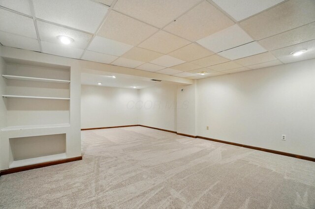 1574 River Bend Rd, Columbus, OH 43223 - finished below grade area with carpet floors and a drop ceiling