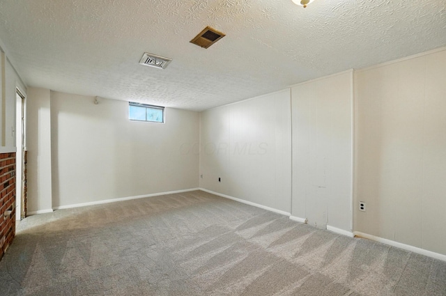 1574 River Bend Rd, Columbus, OH 43223 - basement with a textured ceiling and carpet