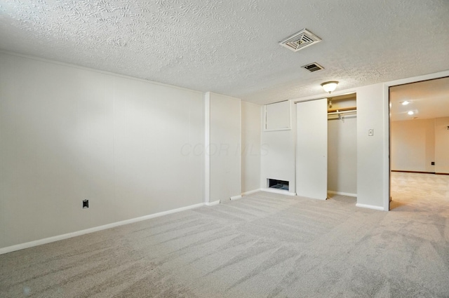 1574 River Bend Rd, Columbus, OH 43223 - finished below grade area featuring carpet and a textured ceiling